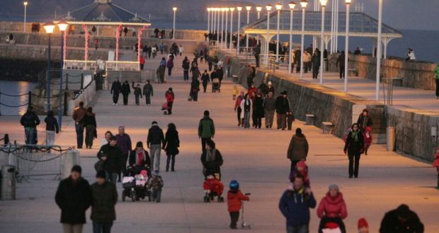 Winter walkers on the East Pier in Dun Laoghaire, last evening. Photograph: Cyril Byrne